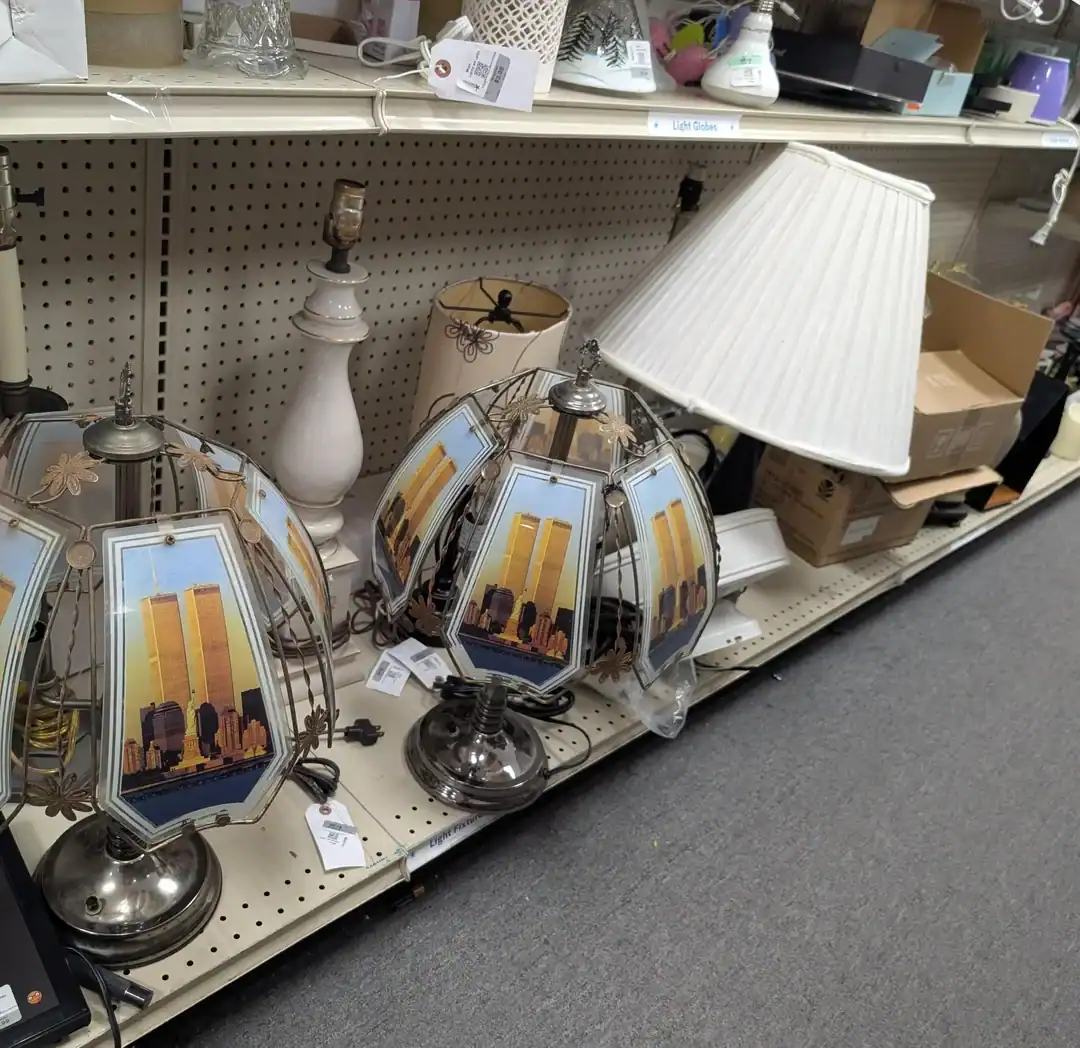 Vintage cityscape stained glass lamps, perfect for home decor or thrift store finds.