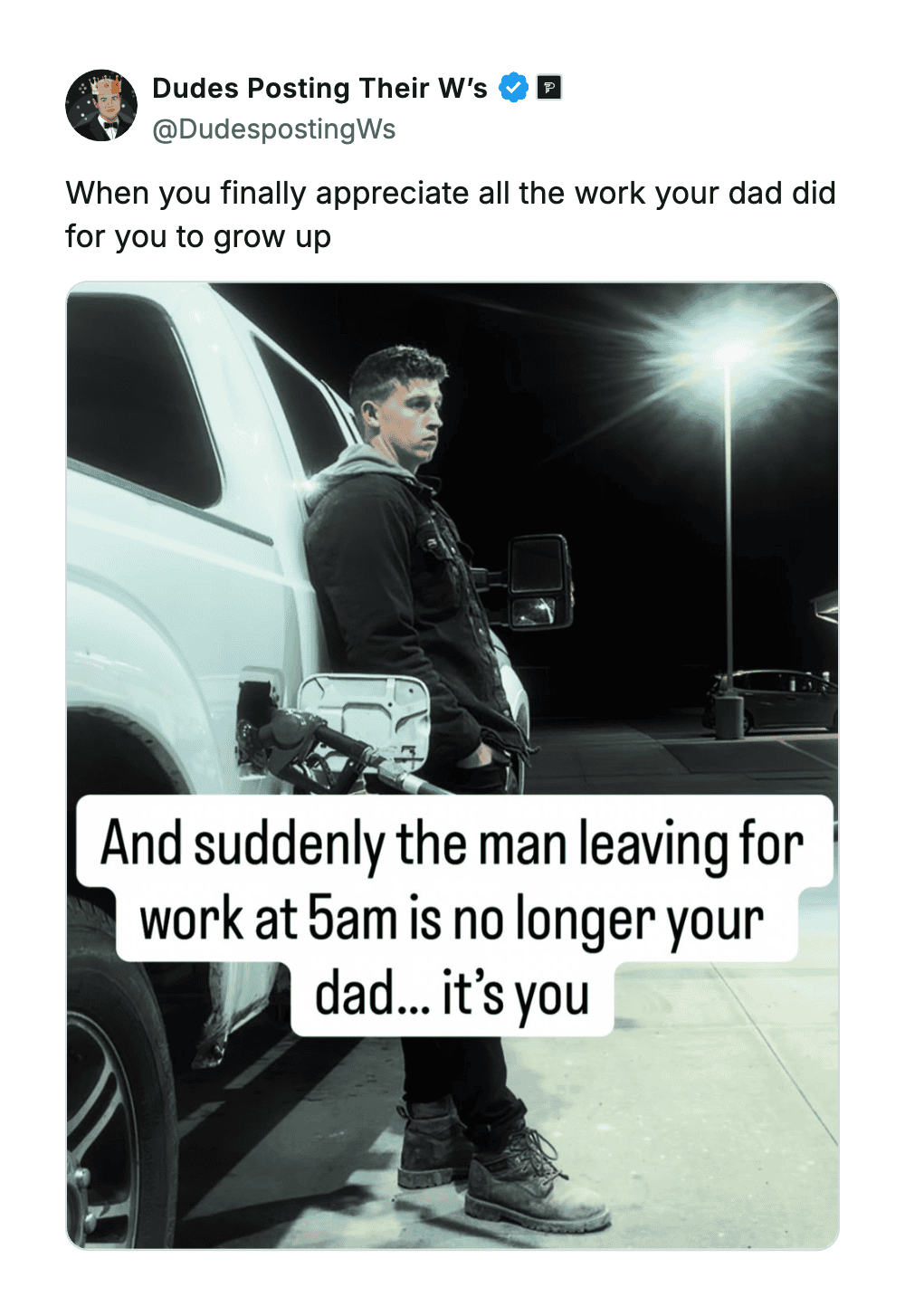 Young man standing next to a truck at night, reflecting on work and growth.