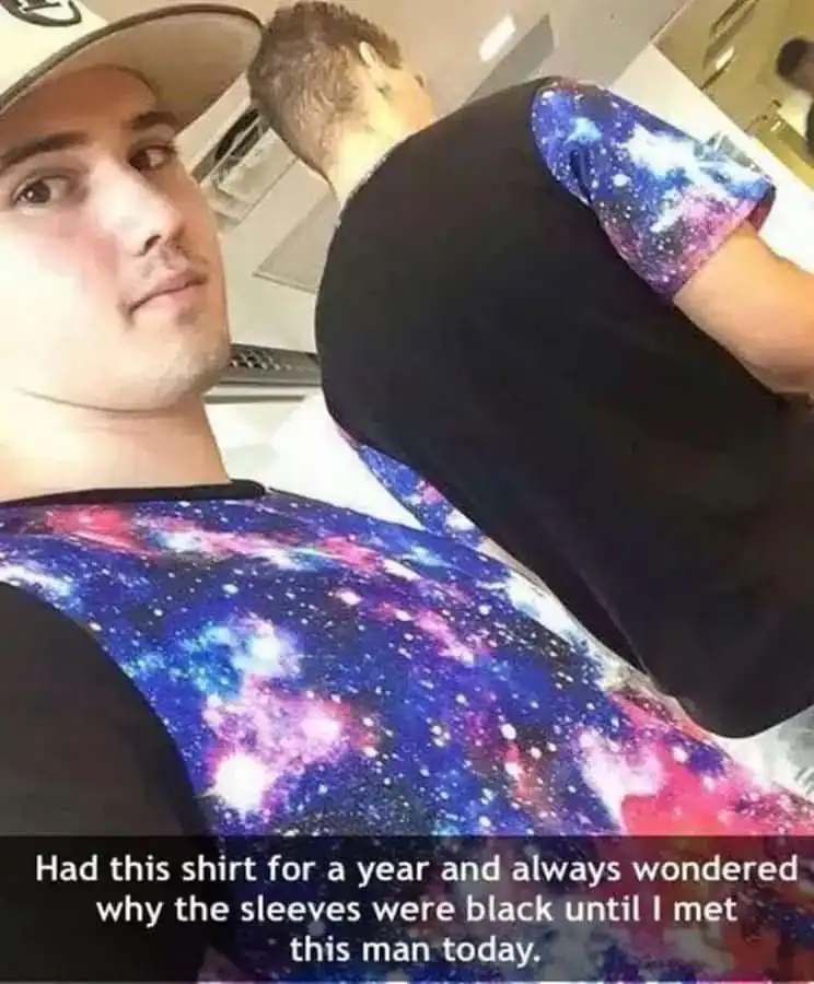 Vibrant galaxy print t-shirt worn by a young man in a casual setting.