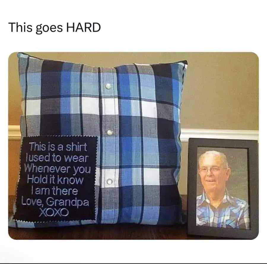 Plaid pillow with sentimental message and framed photo of elderly man.