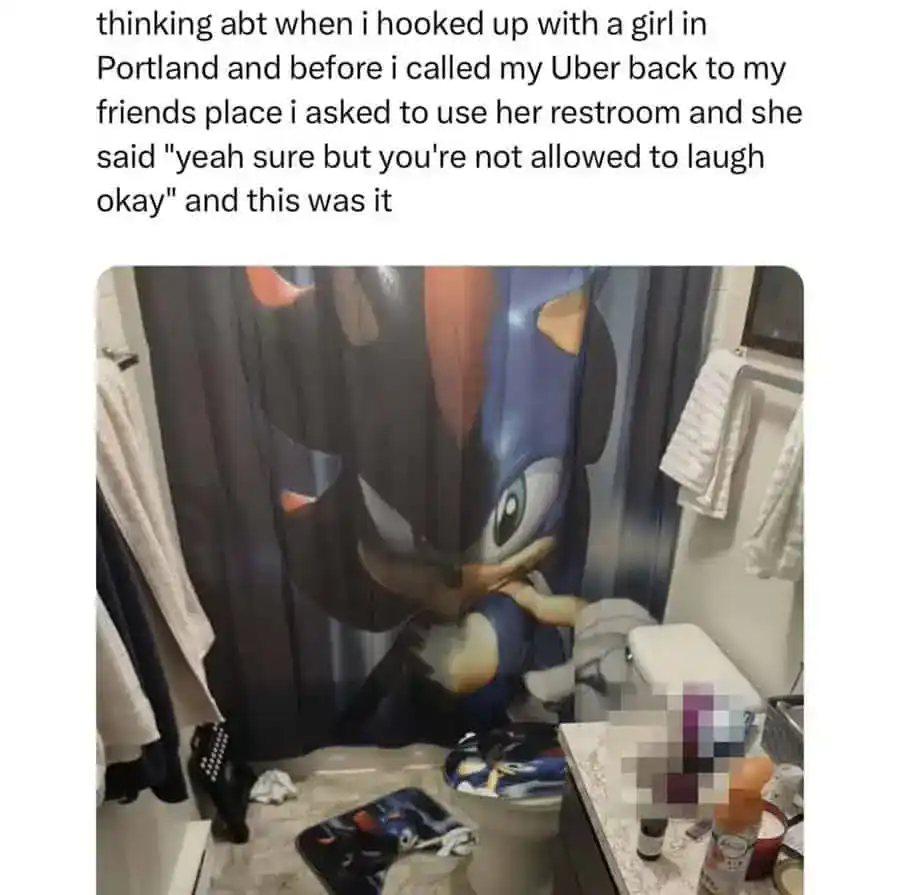 Humorous cartoon of a bathroom with a large Mickey Mouse mural and cluttered countertop.