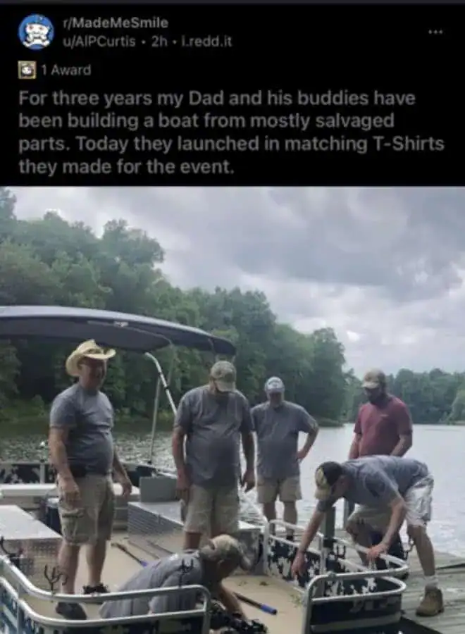Group of men building a boat from salvaged parts on a boat dock.
