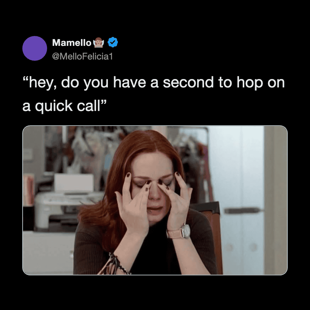 Woman with red hair holding her face in frustration during a busy workday.