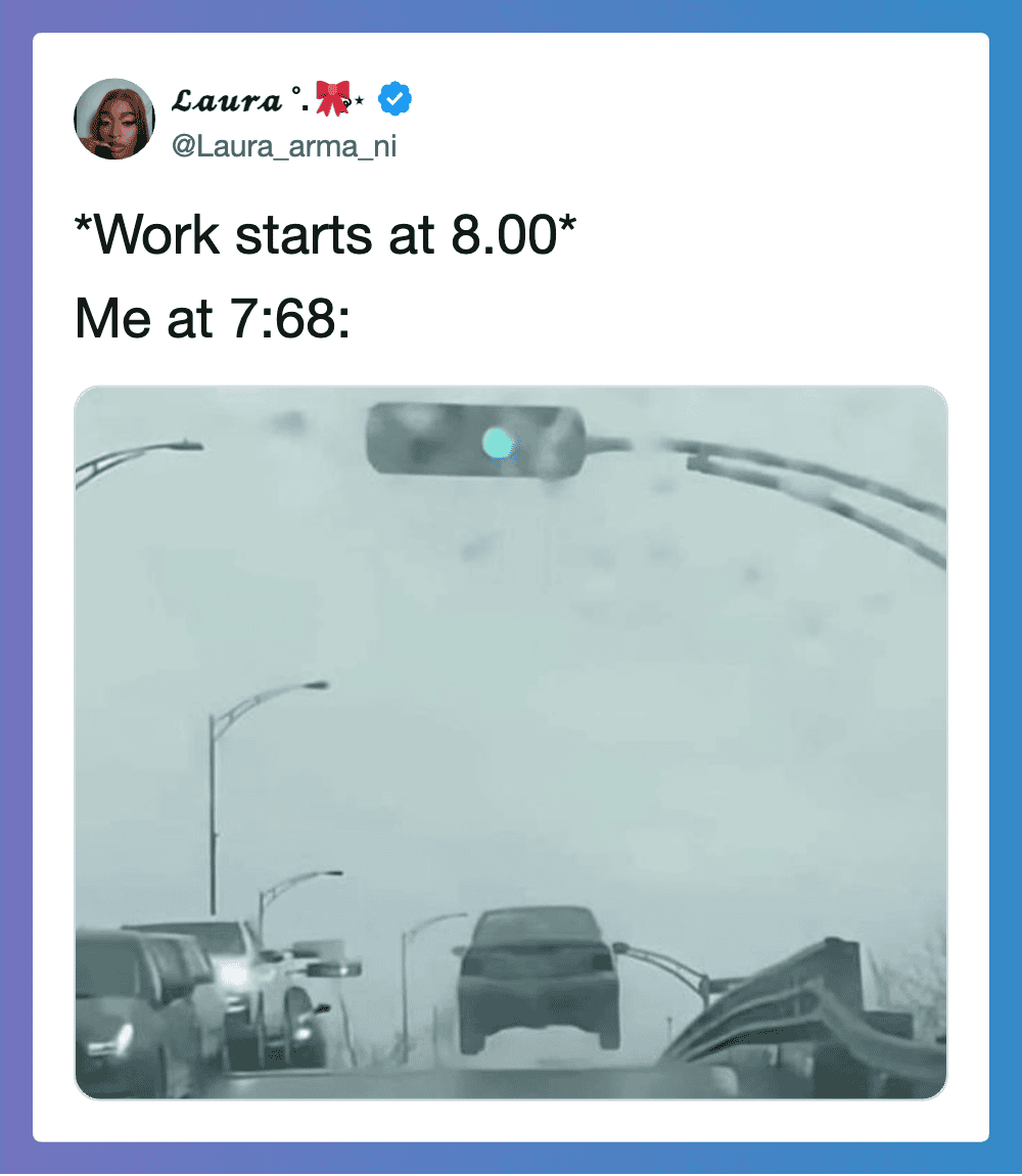 Traffic light and cars on a rainy day, caption about work start time and being late.