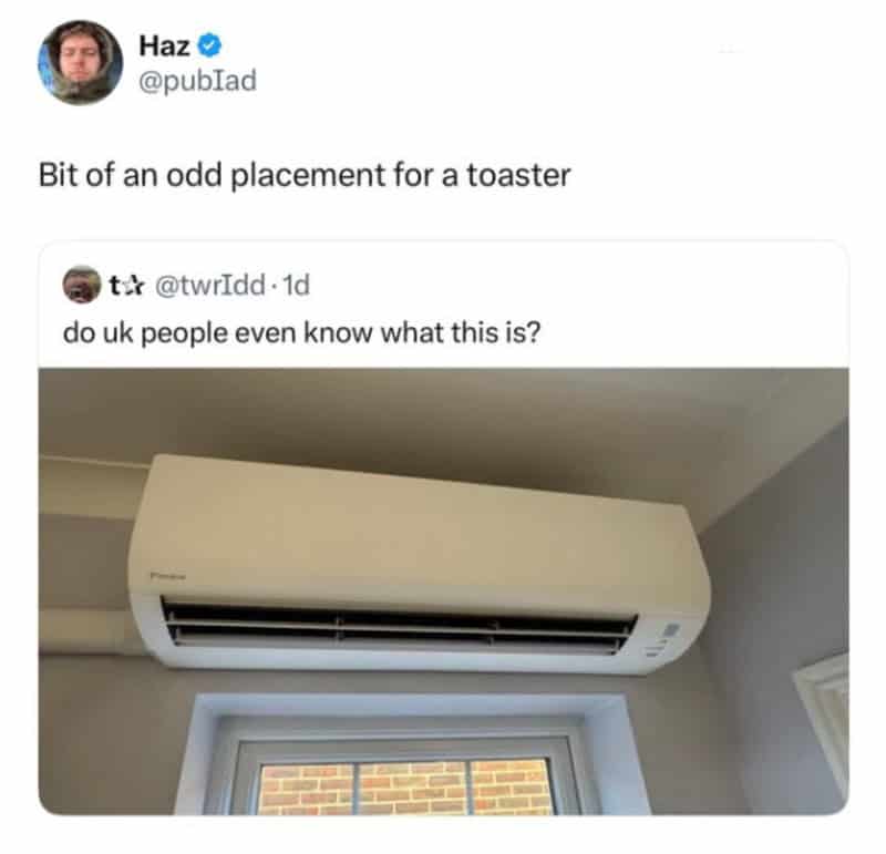 Air conditioner mounted above a window with a humorous caption about placement.