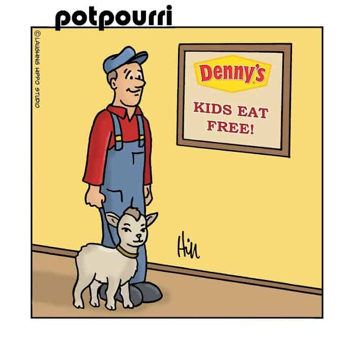 Boy with dog standing in front of Denny's Kids Eat Free sign.