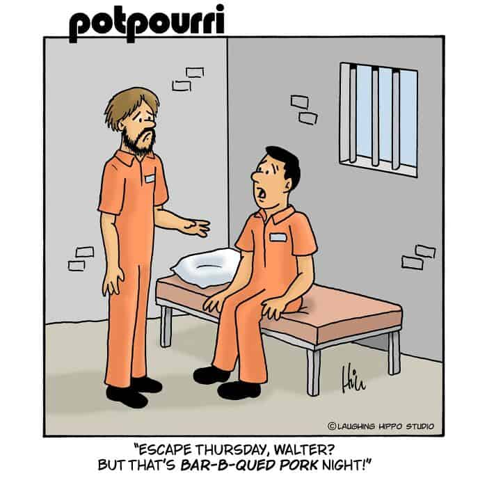 A woman and a man in prison uniforms having a conversation in a cell.