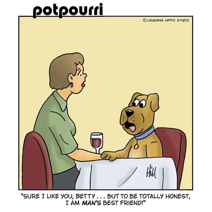 A woman and a dog sitting at a table, holding paws, with a glass of wine.