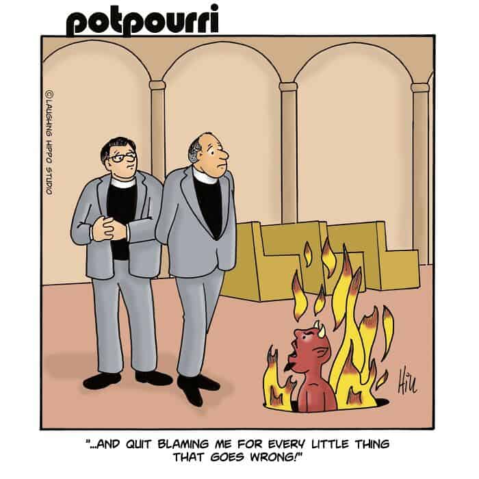 A1: Two men in suits looking at a small creature on fire with horns, inside a room with arches.