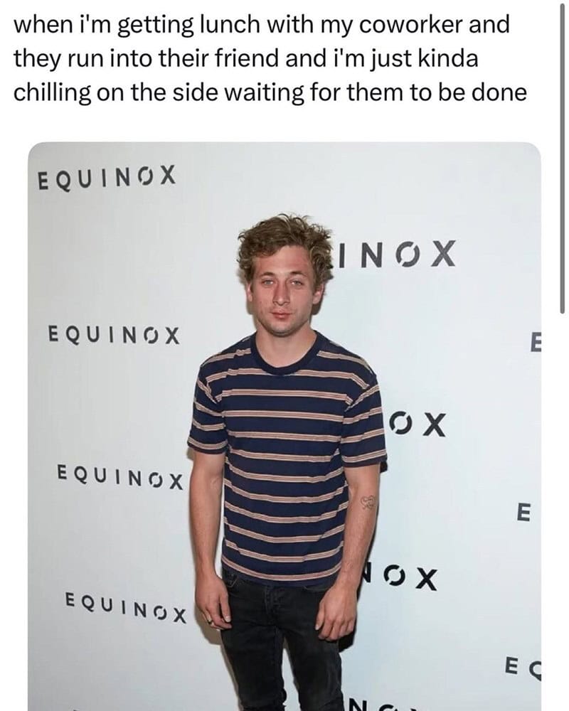 Young man with curly hair in a striped shirt standing in front of a white background with 'EQUINOX'.