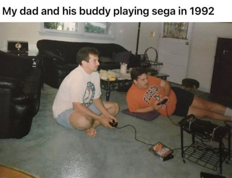 My dad and his buddy playing Sega in 1992.