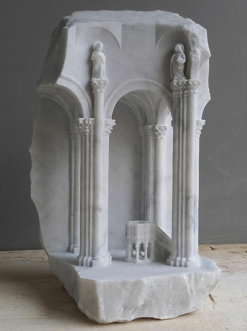 Marble sculpture of classical architecture with columns and statues, part of Matthew Simmonds' work.