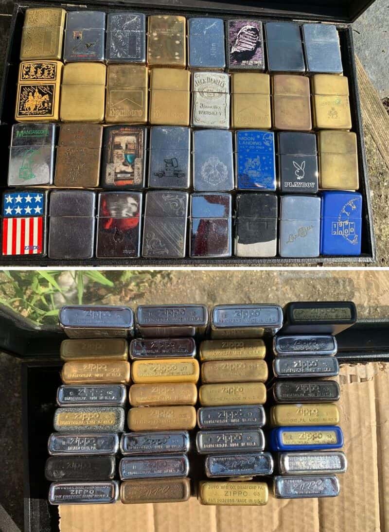 Collection of vintage Zippo lighters in various colors and designs.