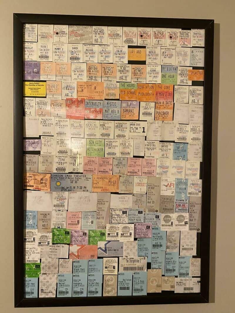 Collection of various tickets and memorabilia in a frame.