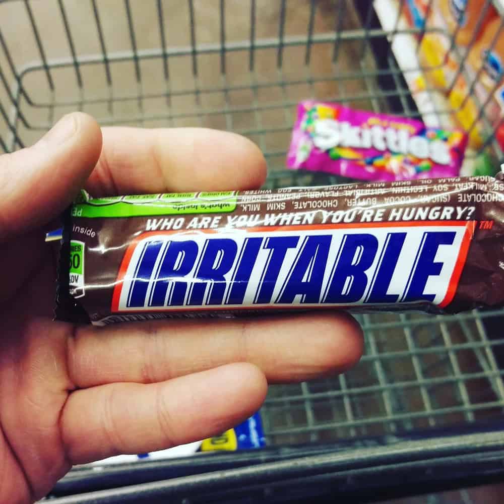 IRRITABLE candy bar with the question "Who are you when you're hungry?" on the packaging.