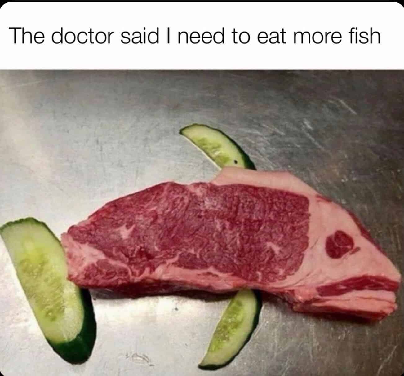 A meat steak with cucumber slices and a caption about eating more fish.