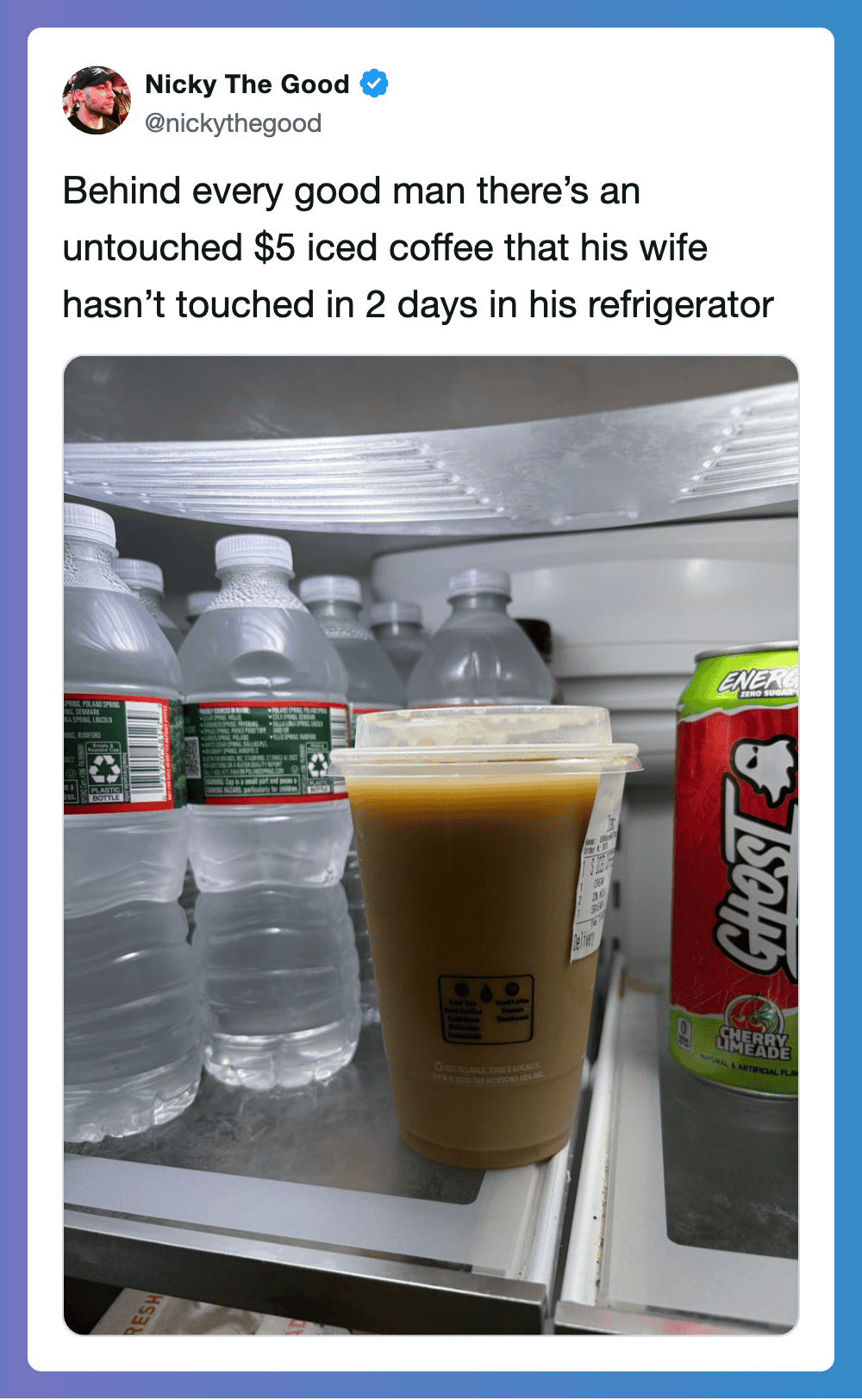 A $5 iced coffee behind bottles of water and a snack in a refrigerator.