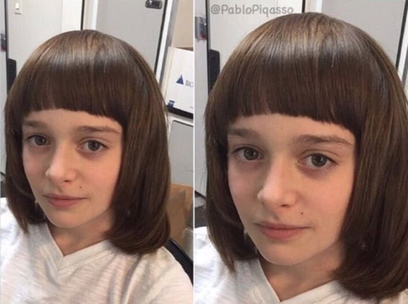 Girl with uneven haircut, one side longer than the other, in a salon.