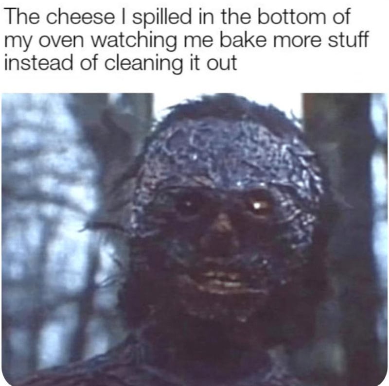 A creature with a face covered in cheese, looking mischievous.