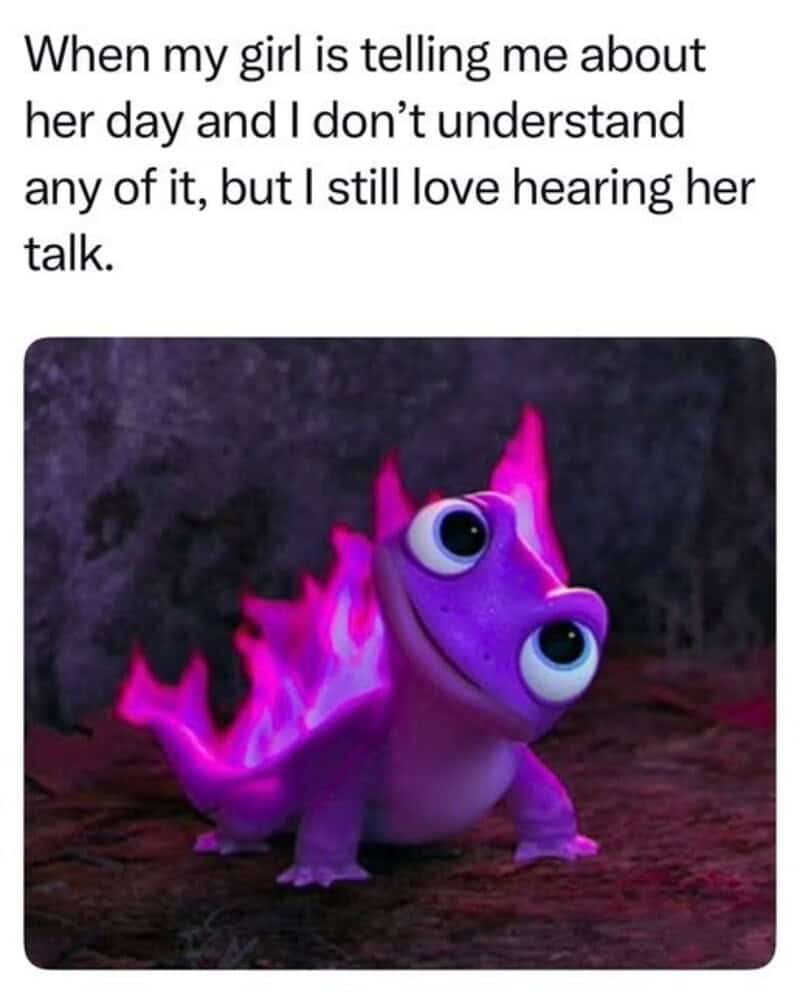Cute purple cartoon creature with big eyes and a glowing tail, on a dark background.
