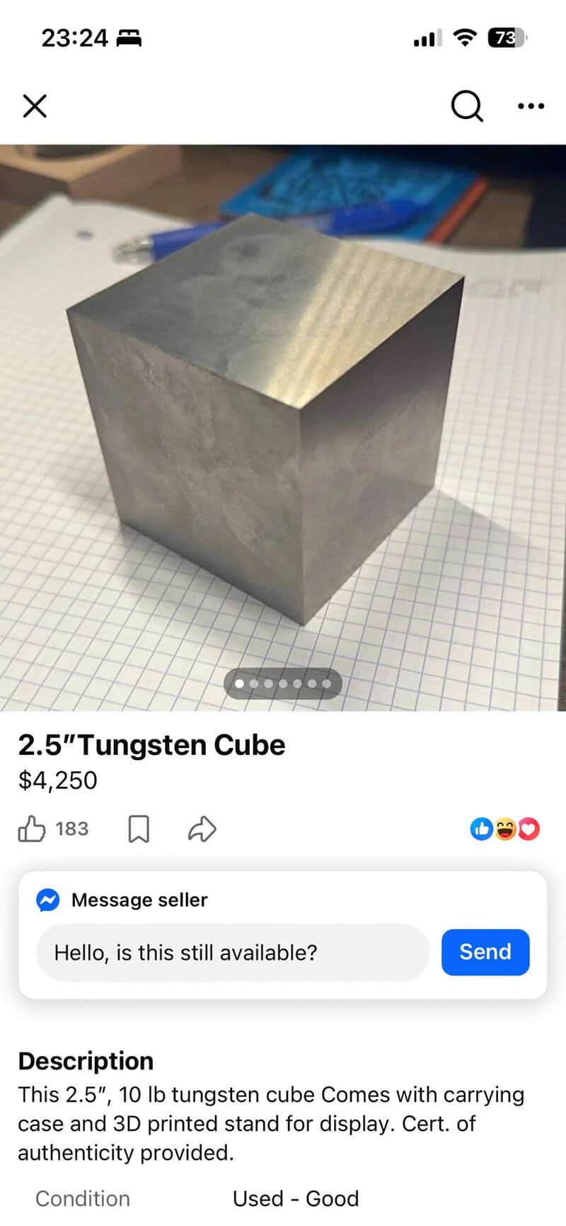 2.5" Tungsten Cube for sale at $4,250, shown on graph paper.