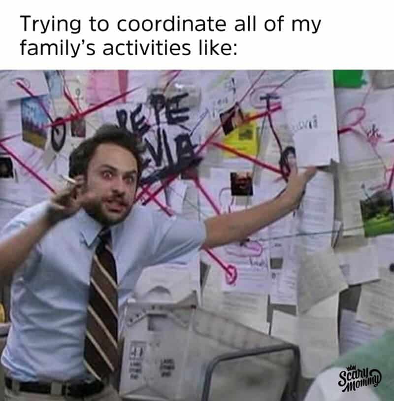 Man trying to coordinate family activities with a chaotic corkboard.