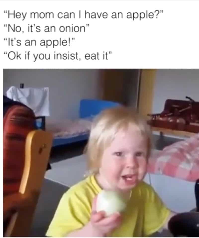 A1: Child holding an onion with a humorous caption about an apple and onion.