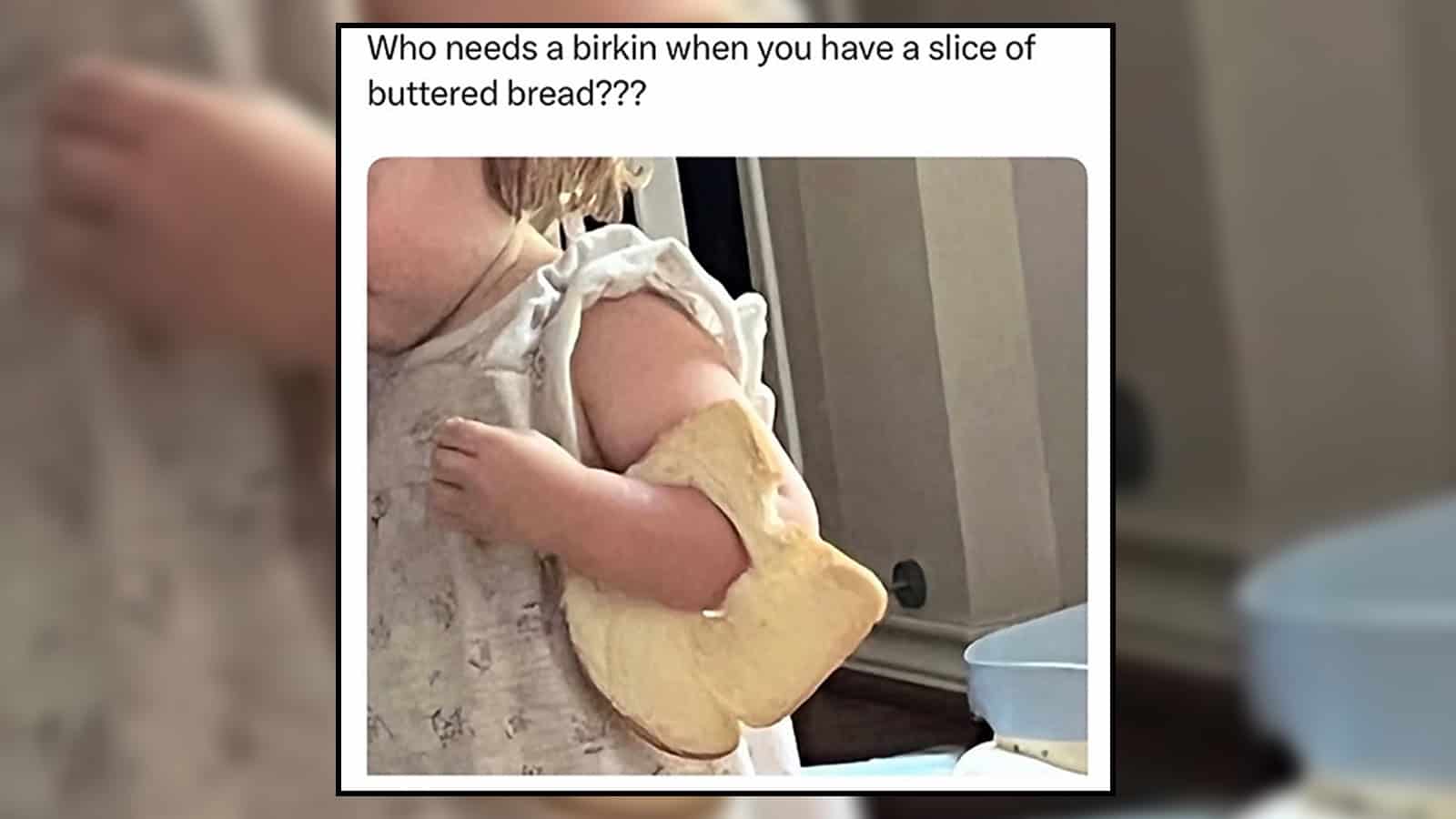 A baby holding a slice of bread with a mitten on their hand, humorous meme.