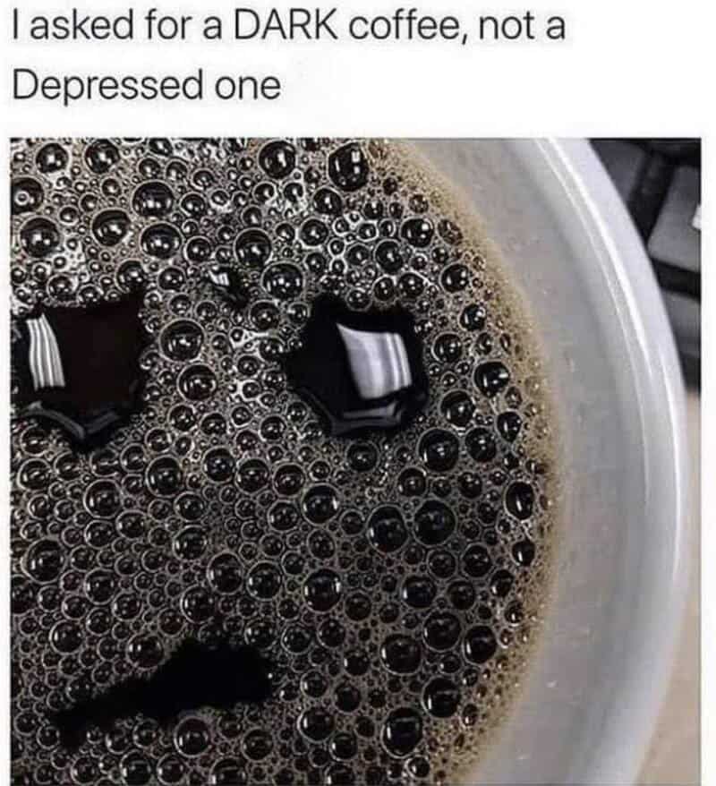 Dark coffee with ice cubes in a cup, bubbles on the surface, and a caption about asking for dark cof.