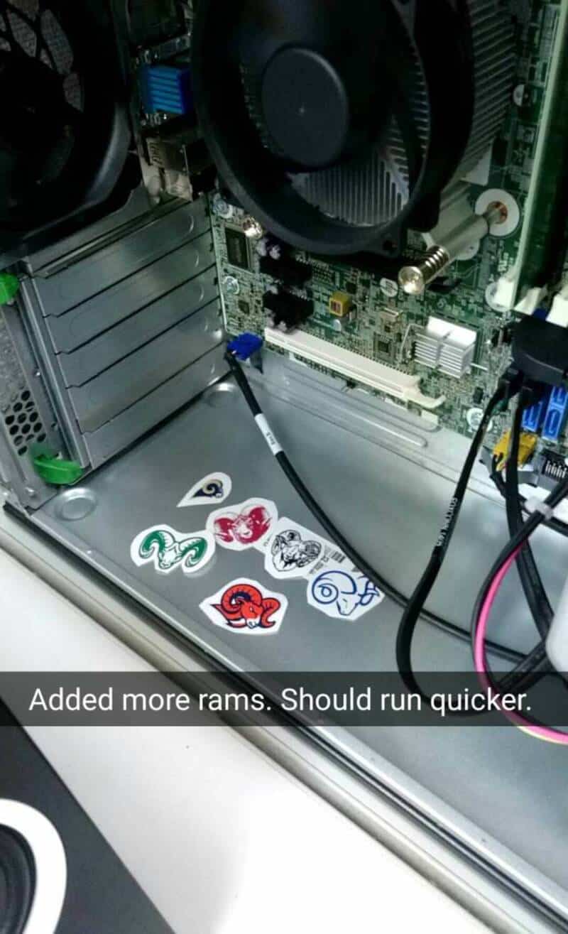ASUS motherboard with RAM stickers and CPU cooler inside a computer case.