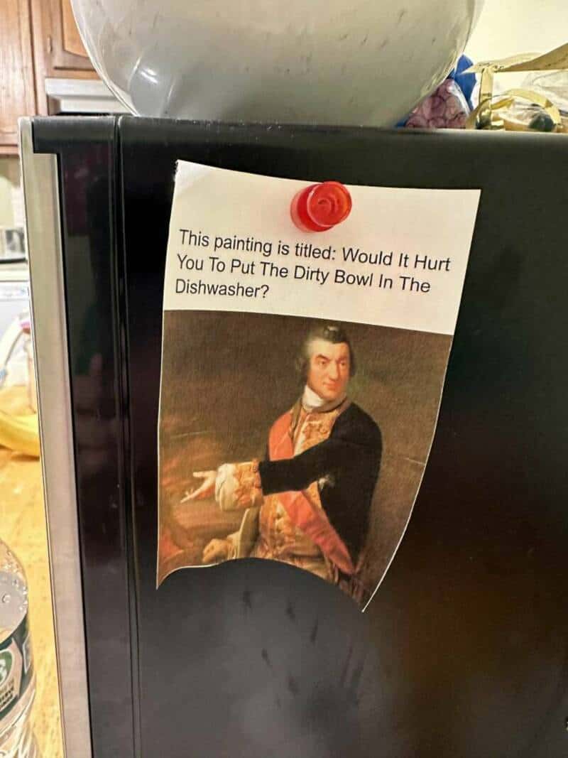 "Would It Hurt You To Put The Dirty Bowl In The Dishwasher?" note attached to a painting of a man in.