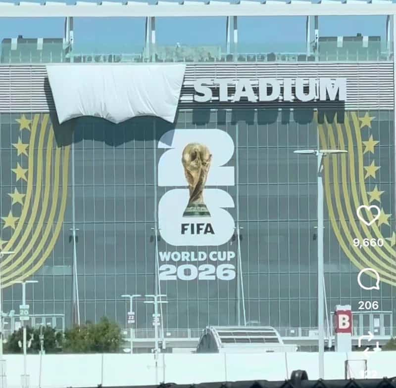 FIFA World Cup 2026 logo on stadium glass facade.