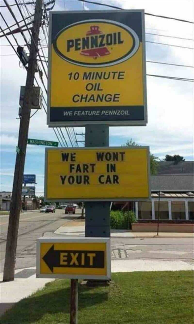 Pennzoil sign with humorous message about oil change and farting in your car.