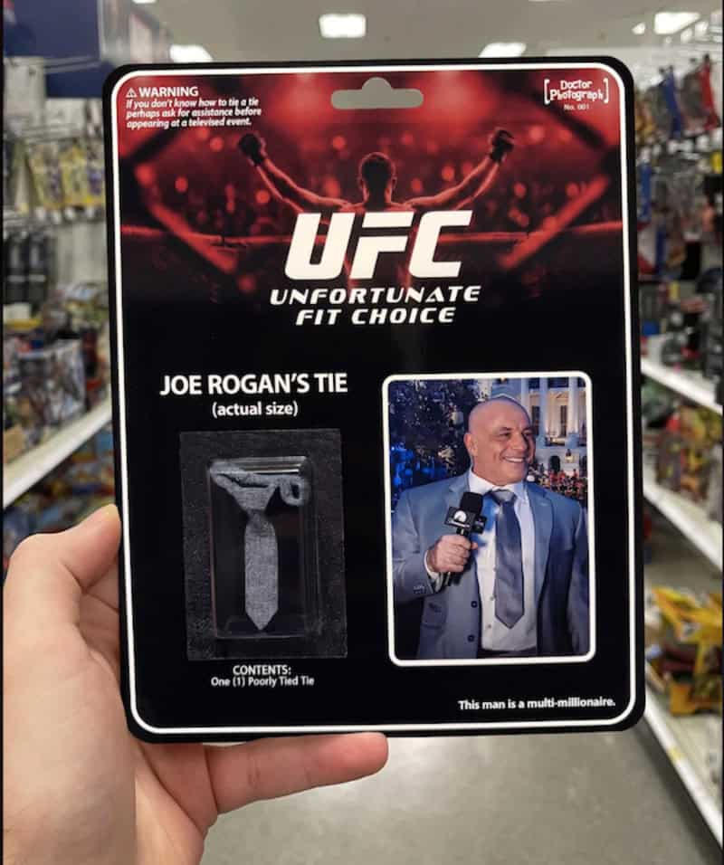 UFC Unfortunate Fit Choice Joe Rogan's Tie actual size with photo of Joe Rogan in suit.
