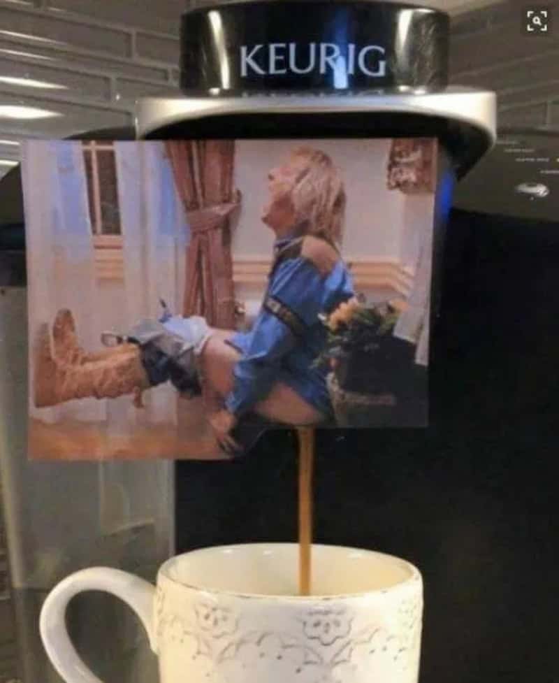 Keurig coffee machine with a photo of a woman in a blue dress attached to the coffee stream.