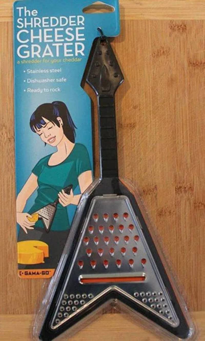 The Shredder Cheese Grater with a cartoon woman grating cheese.