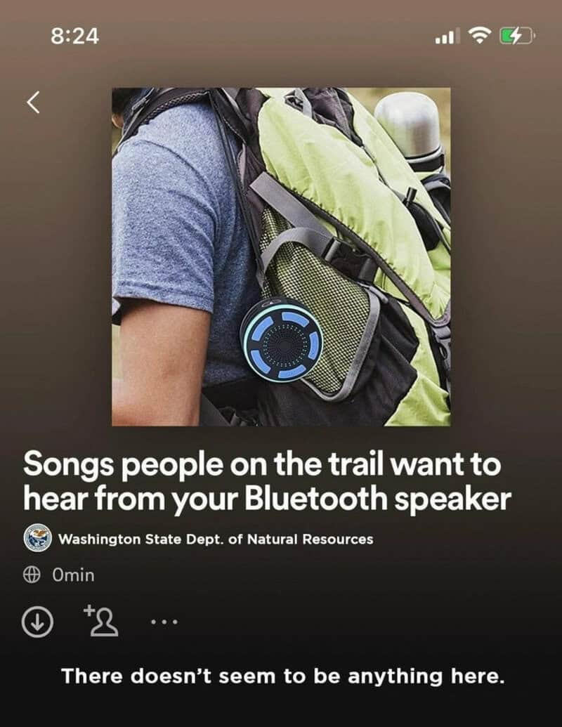 Person with a backpack and a Bluetooth speaker attached, with text about songs on the trail.