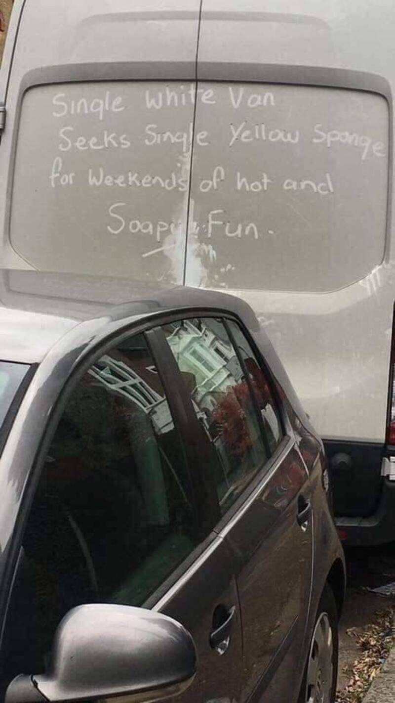 White van with handwritten message about a yellow sponge and soap fun.