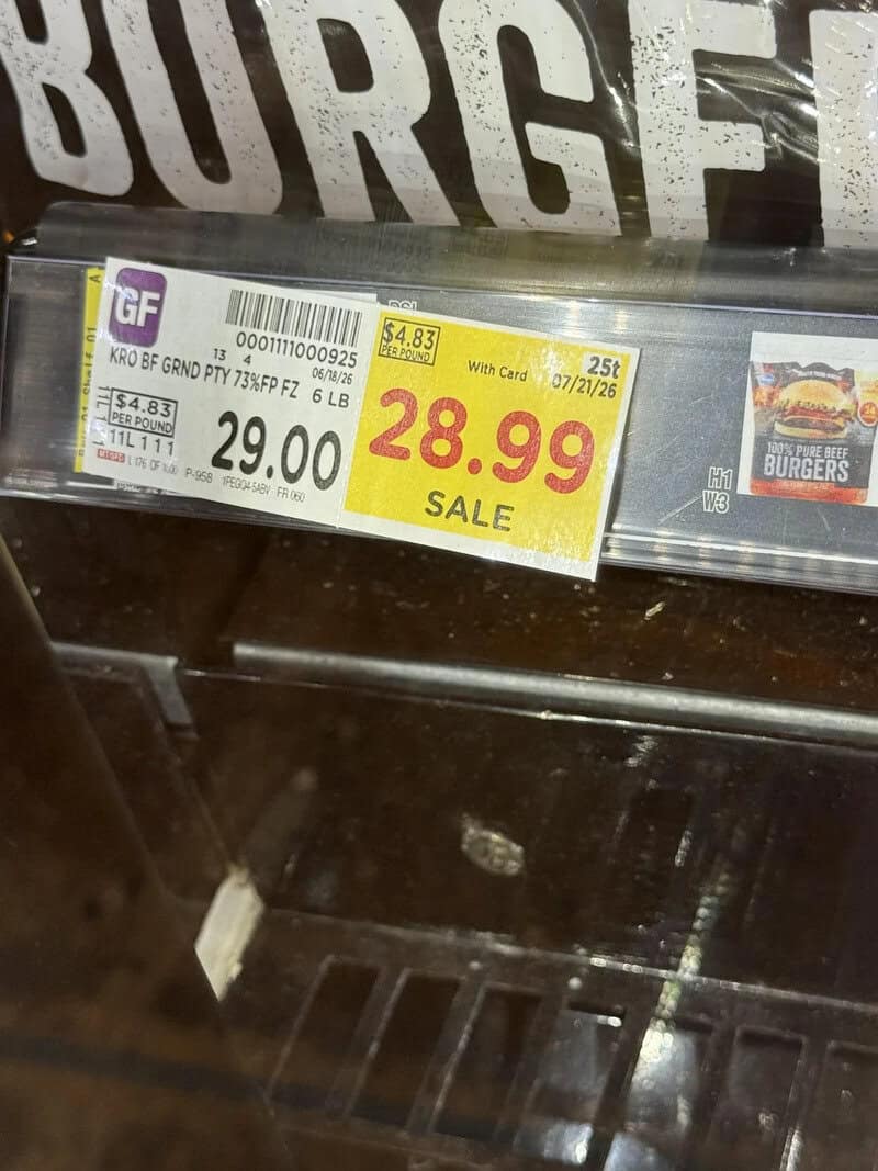 Price tag showing sale price of $28.99 for ground beef, original price $29.00.