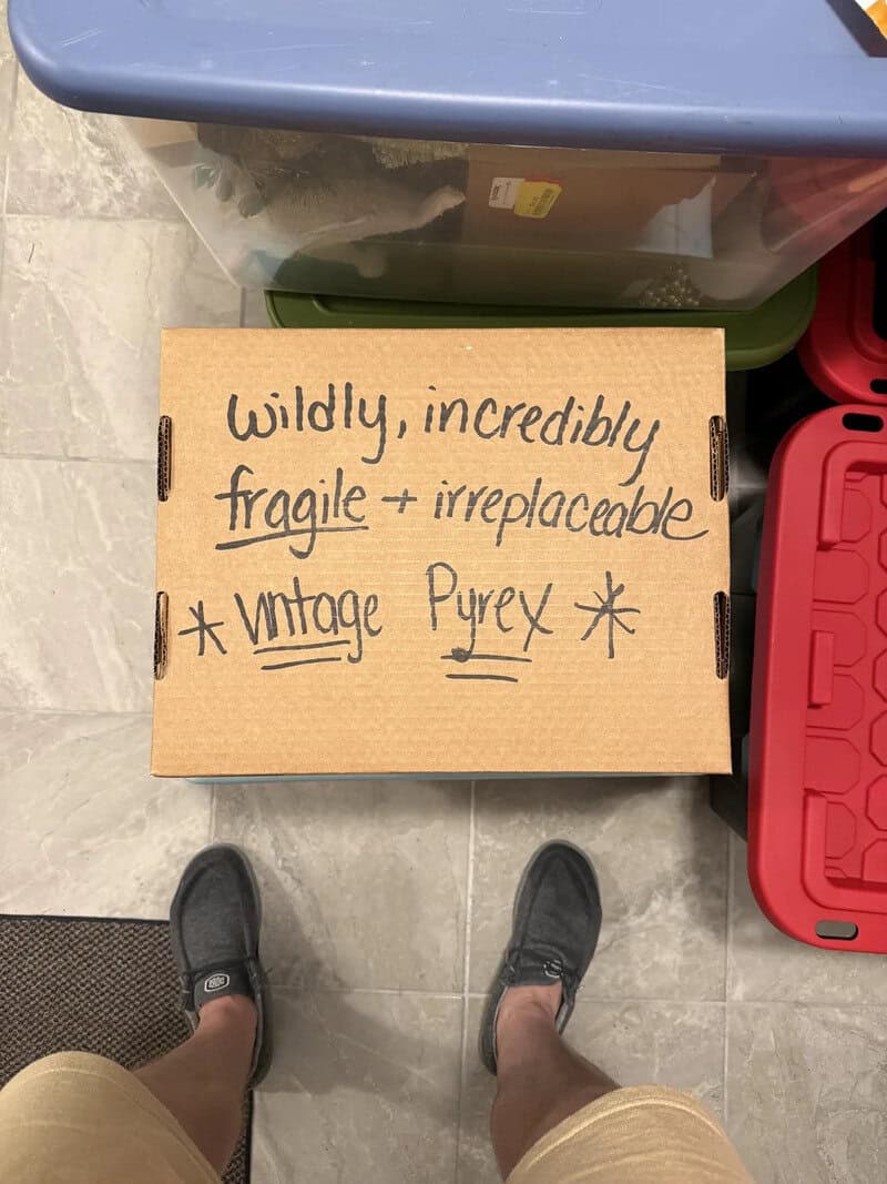 Box with handwritten note: 'Wildly, incredibly fragile + irreplaceable *vintage Pyrex*'.