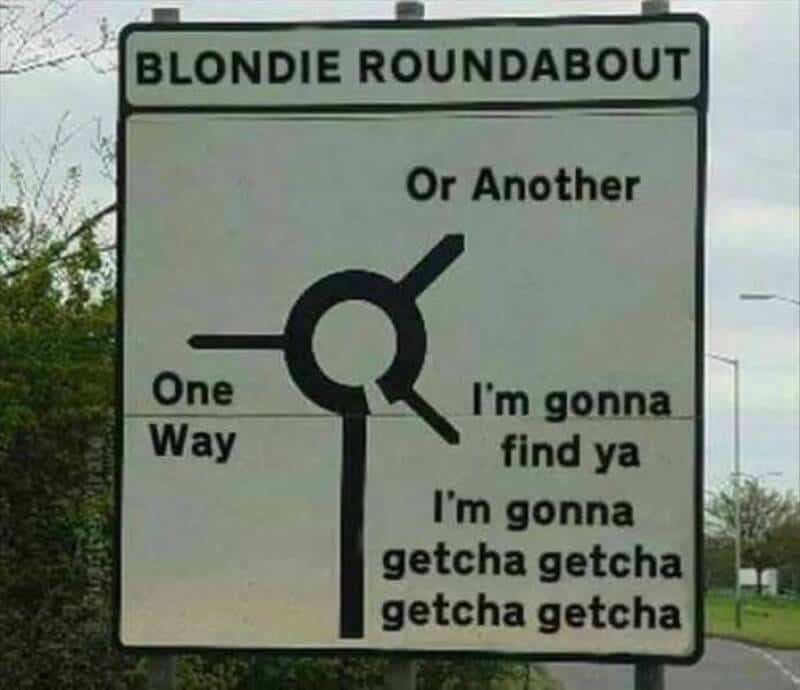 BLONDIE ROUNDABOUT sign with humorous text about a roundabout and a song lyric parody.