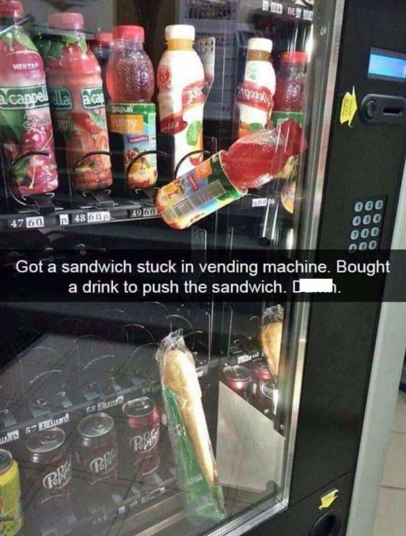 Got a sandwich stuck in vending machine. Bought a drink to push the sandwich. D____.