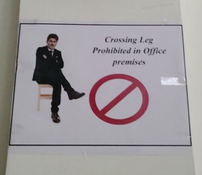 Crossing Leg Prohibited in Office premises.