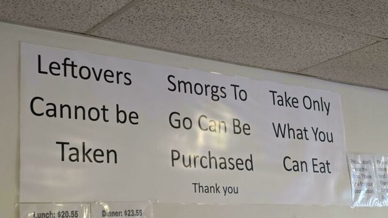 Sign with misspelled words and phrases about leftovers and food.