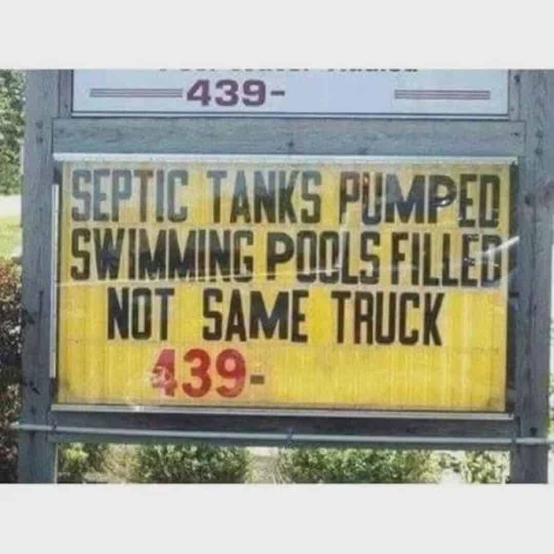 Sign reads 'SEPTIC TANKS PUMPED SWIMMING POOLS FILLED NOT SAME TRUCK'.