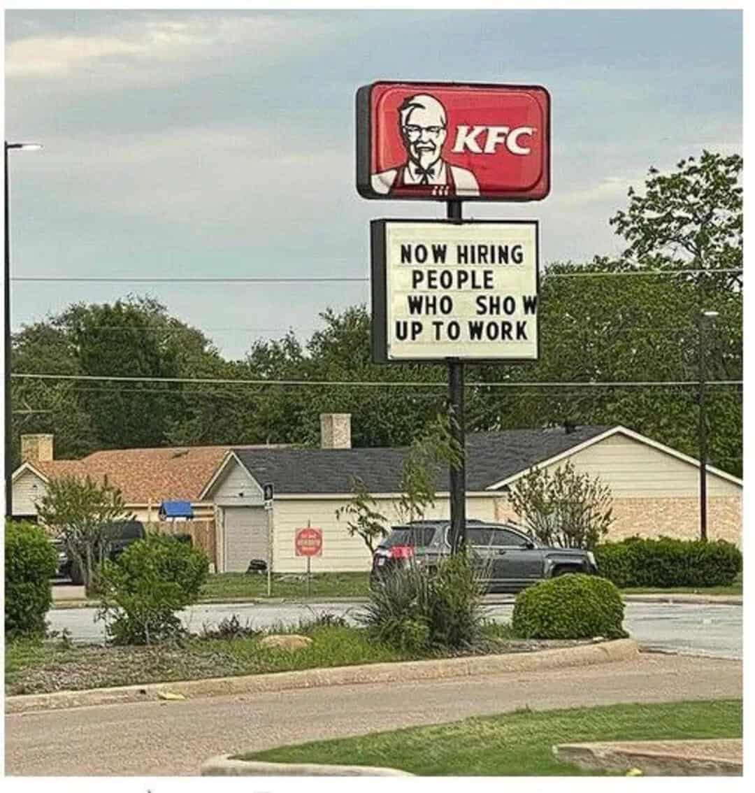 KFC sign with a humorous job ad about hiring people who show up to work.