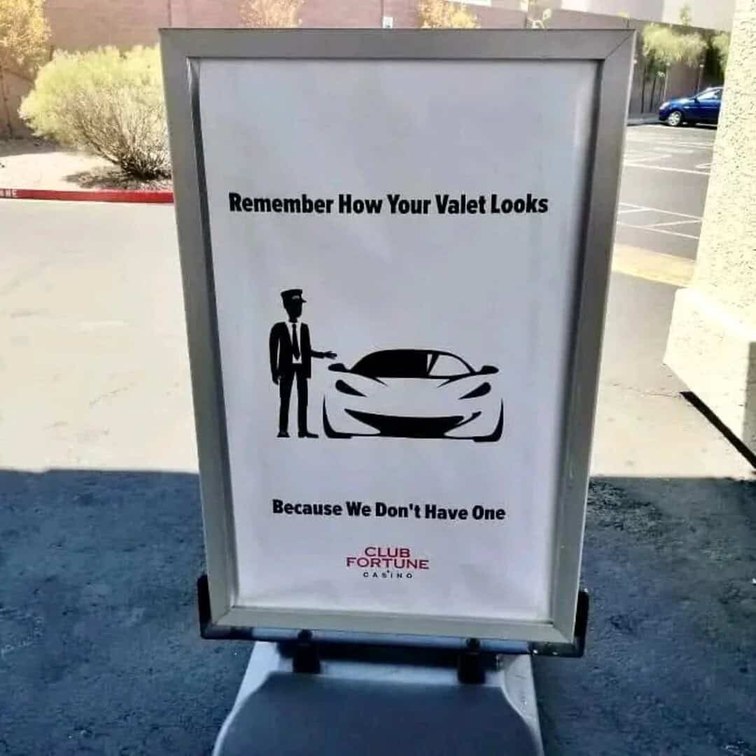 Sign reminding valet to look like a police officer, with a car illustration.