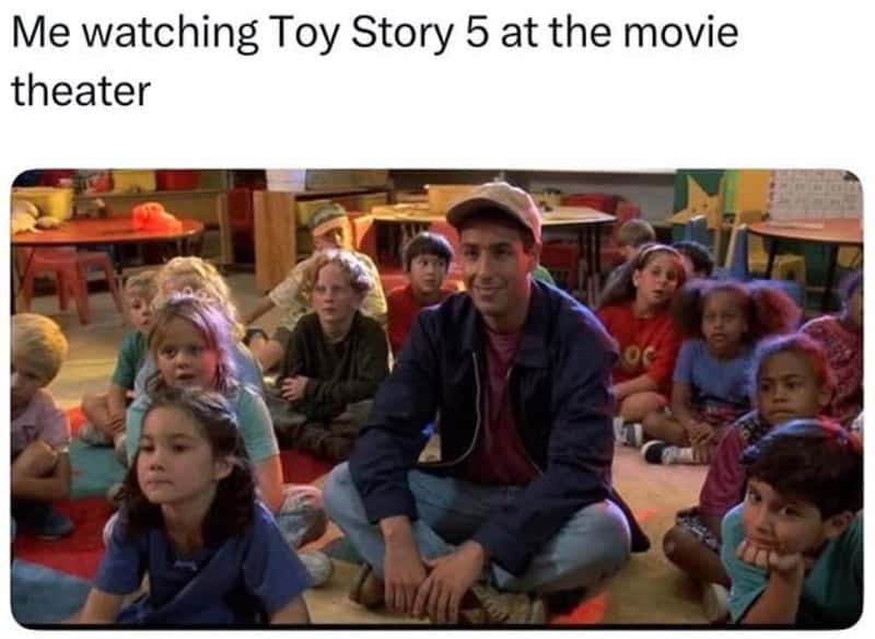 Watching Toy Story 5 at the movie theater with children sitting on the floor.