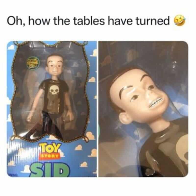 Toy Story Sid doll with altered head, showing a funny expression.