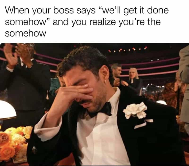 Man in tuxedo facepalms at a work event, caption about boss and work.